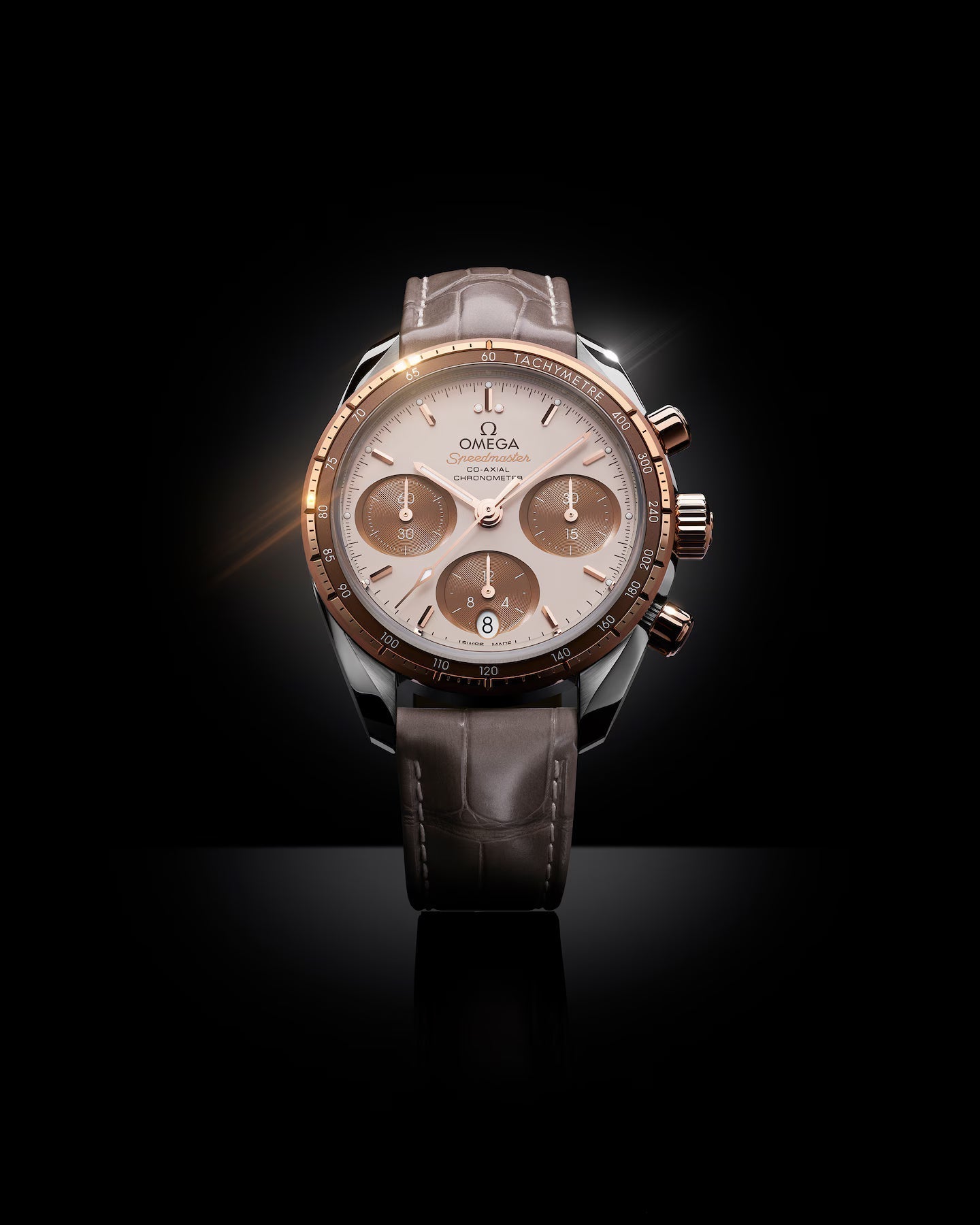 Omega Speedmaster 38 mm gold on leather strap